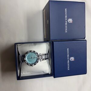 Invicta Silver Watch with Teal Dial